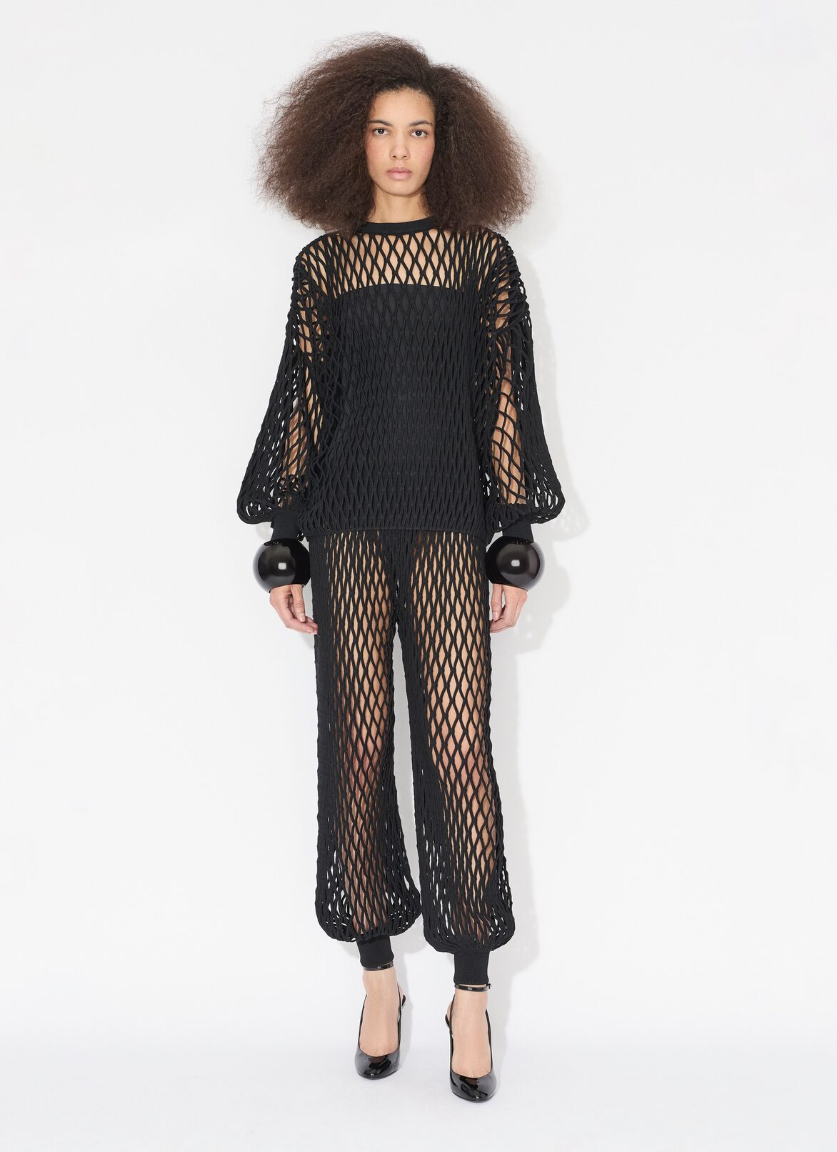 MACRAMÉ KNIT PANTS ALAÏA BLACK MACRAMÉ KNIT PANTS
